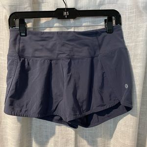 Lululemon running shorts with lining size 4 taupe grey.